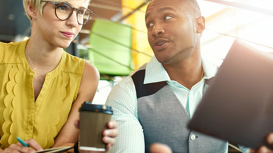 Man and woman in a meeting