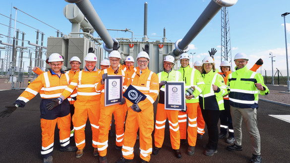 Viking Link team members holding the Guinness World Record certificates and plaque